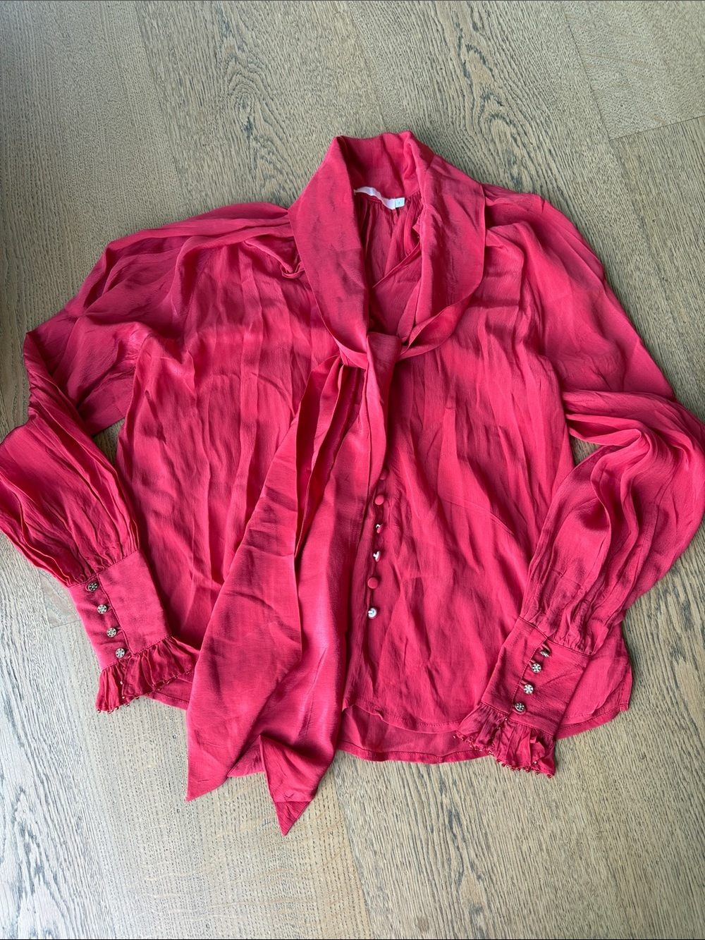Tie-Neck Red Blouse with Ruffle Cuffs
